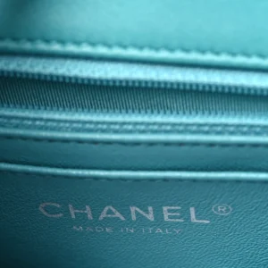 Chanel Quilted Lambskin Mini Rectangular Flap Turquoise logo